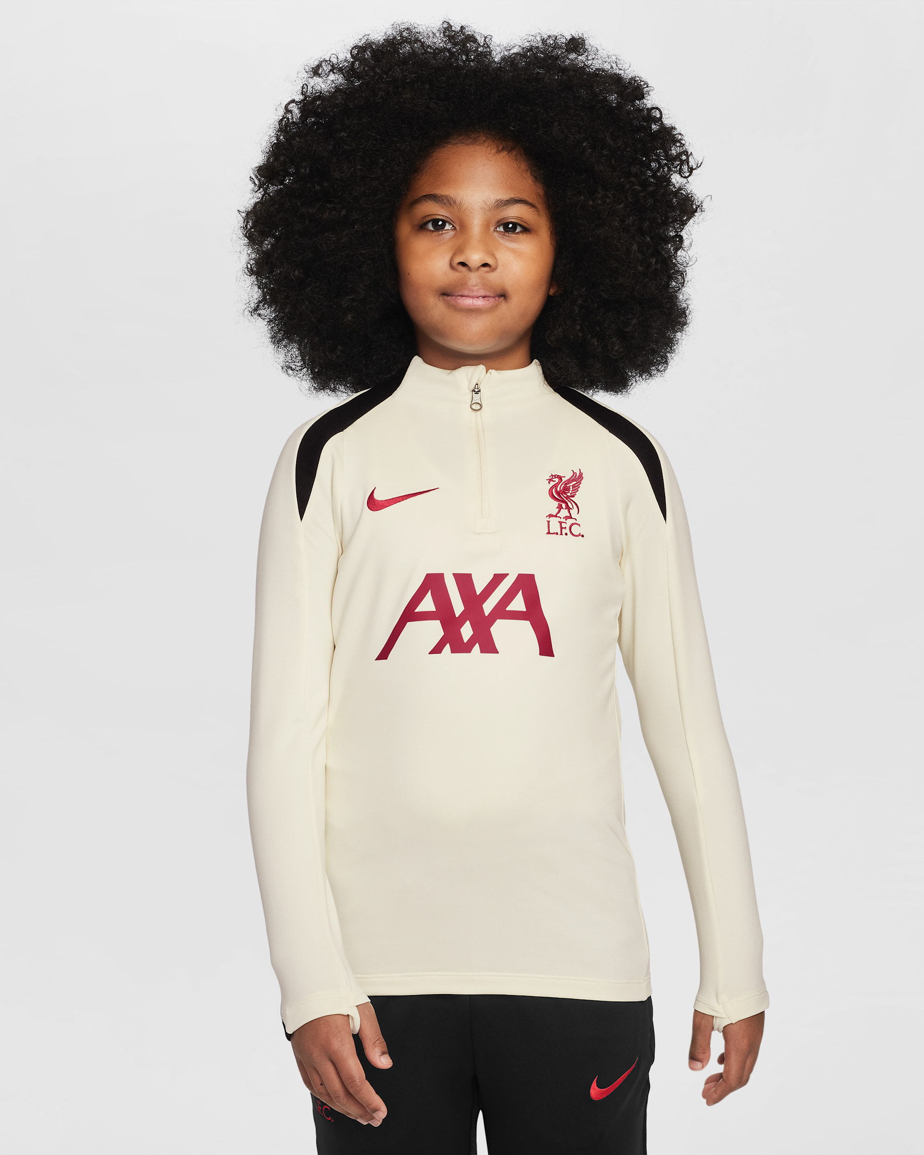 Treningowa koszulka piłkarska dla dużych dzieci Nike Dri-FIT Liverpool F.C. Strike Special Edition - Coconut Milk/Czerń/Gym Red