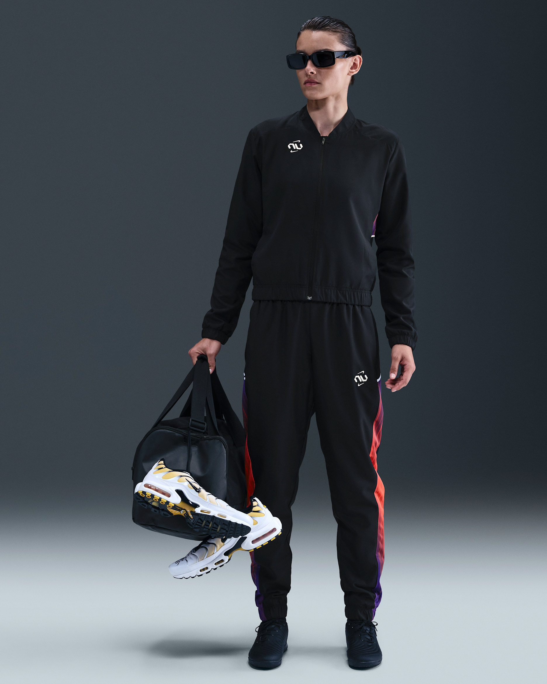Conjunto deportivo de fútbol de tejido Woven Dri-FIT para mujer Nike United Academy - Negro/Concordia oscuro/Vela