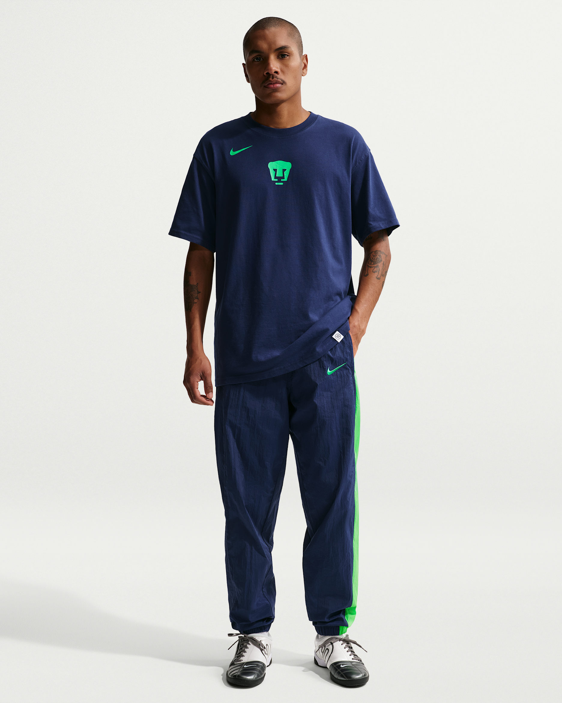 Pants deportivos de fútbol Nike Total 90 de tejido Woven para hombre Pumas UNAM Third - Azul vacío/Verde chispa claro/Verde impacto