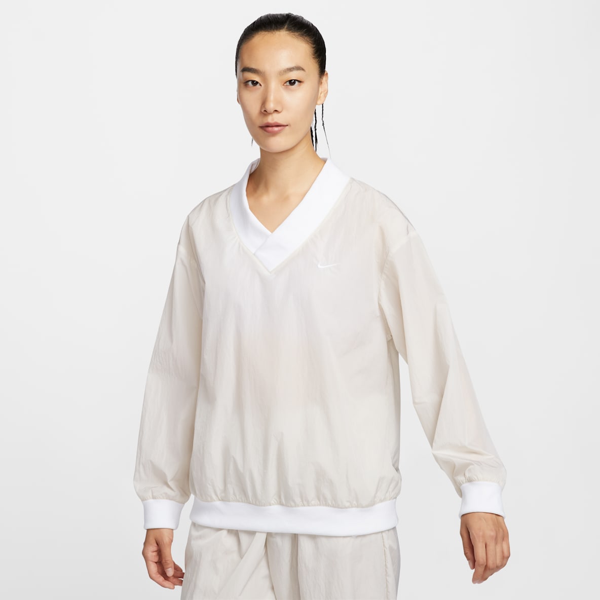 Nike Sportswear Essential Nike Sportswear Essential Women's Loose UV Woven Long-Sleeve V-Neck Top
