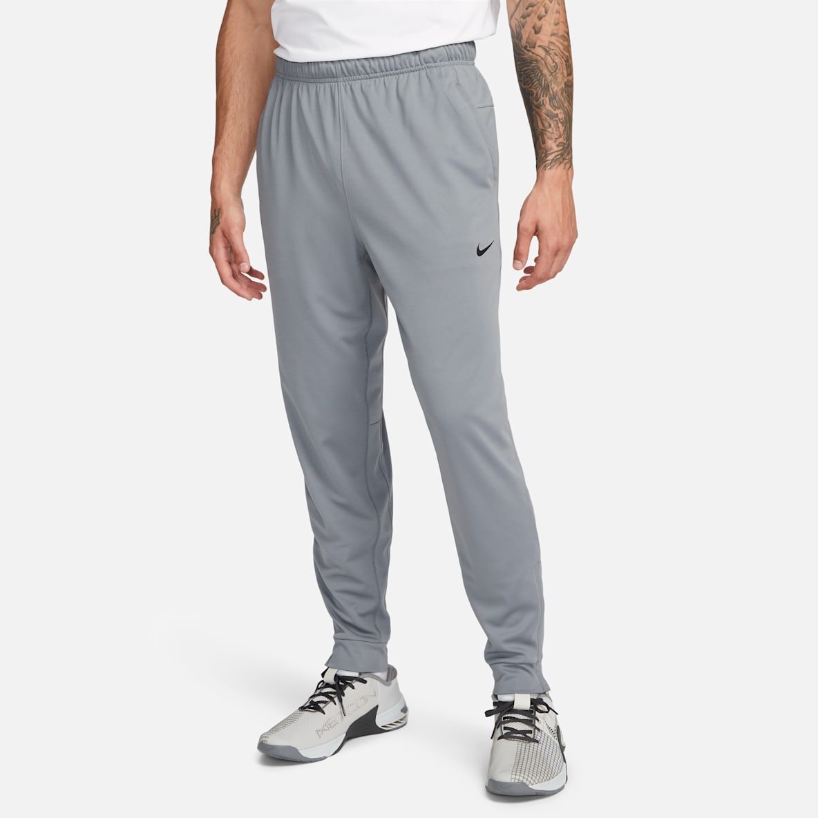 Nike Totality Nike Totality Pants Dri-FIT entallados versátiles para hombre