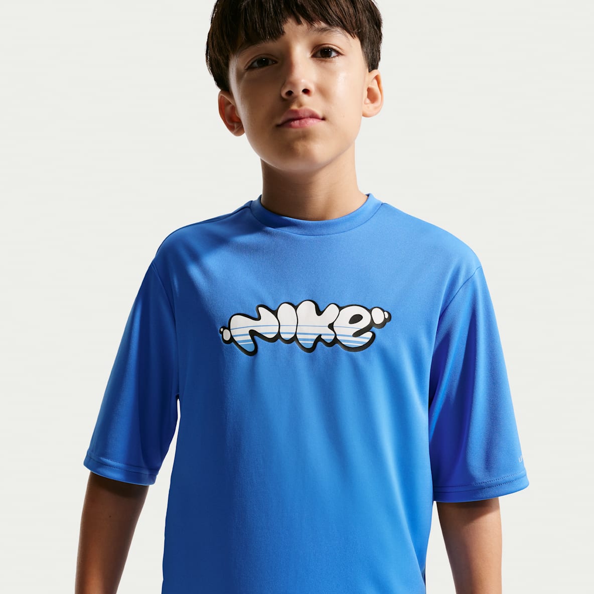 Nike Swim Hydroguard Playera de manga corta Dri-FIT UV para niño talla grande