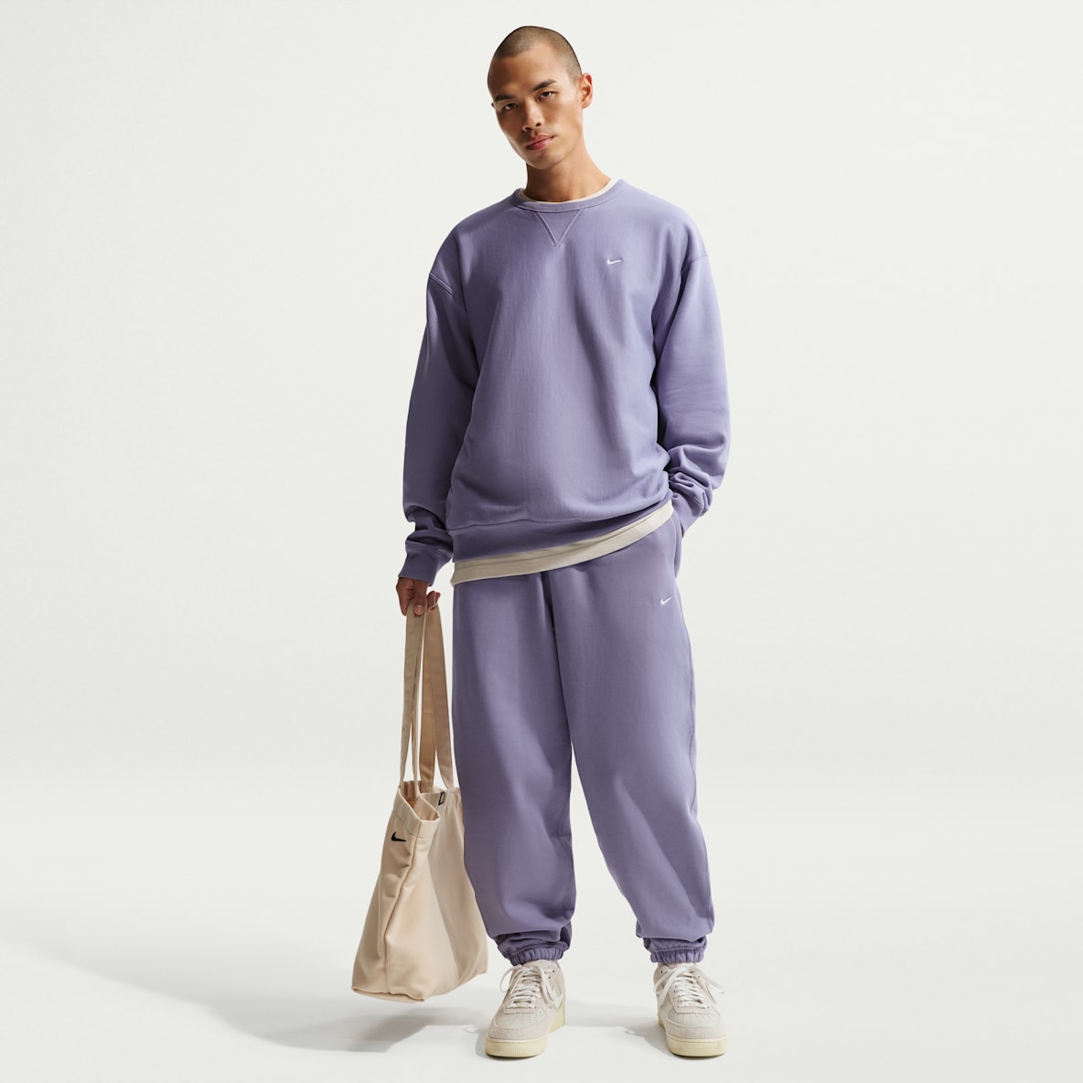 Nike Solo Swoosh Pánské kalhoty z flísu s manžetami