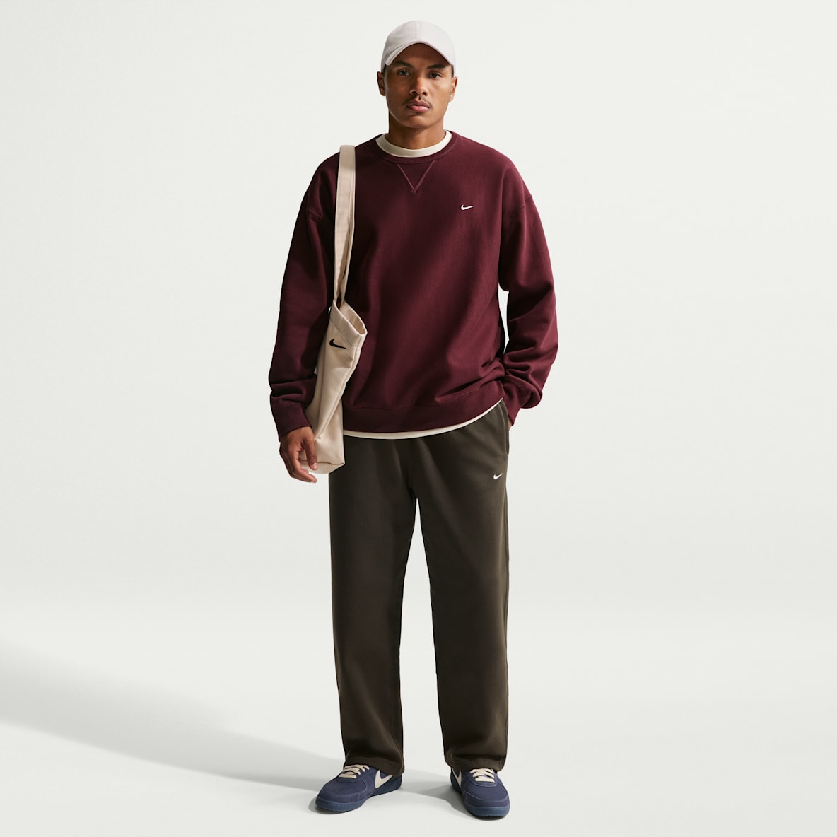 나이키 솔로 스우시 나이키 솔로 스우시 남성 플리스 오픈 헴 팬츠