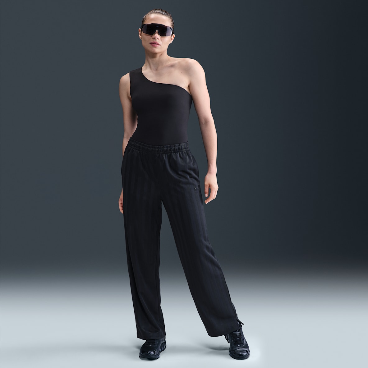 Nike Sportswear Nike Sportswear Pants deportivos de jacquard a rayas de tiro medio holgados para mujer