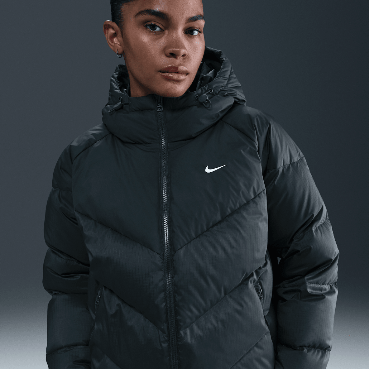 Nike Sportswear Windpuffer Nike Sportswear Windpuffer Jaqueta de plomes ampla amb caputxa Storm-FIT - Dona