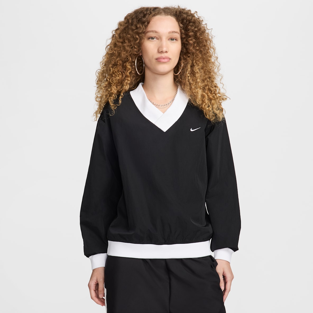 Nike Sportswear Essential Nike Sportswear Essential Playera de manga larga de tejido Woven de cuello en V holgada para mujer