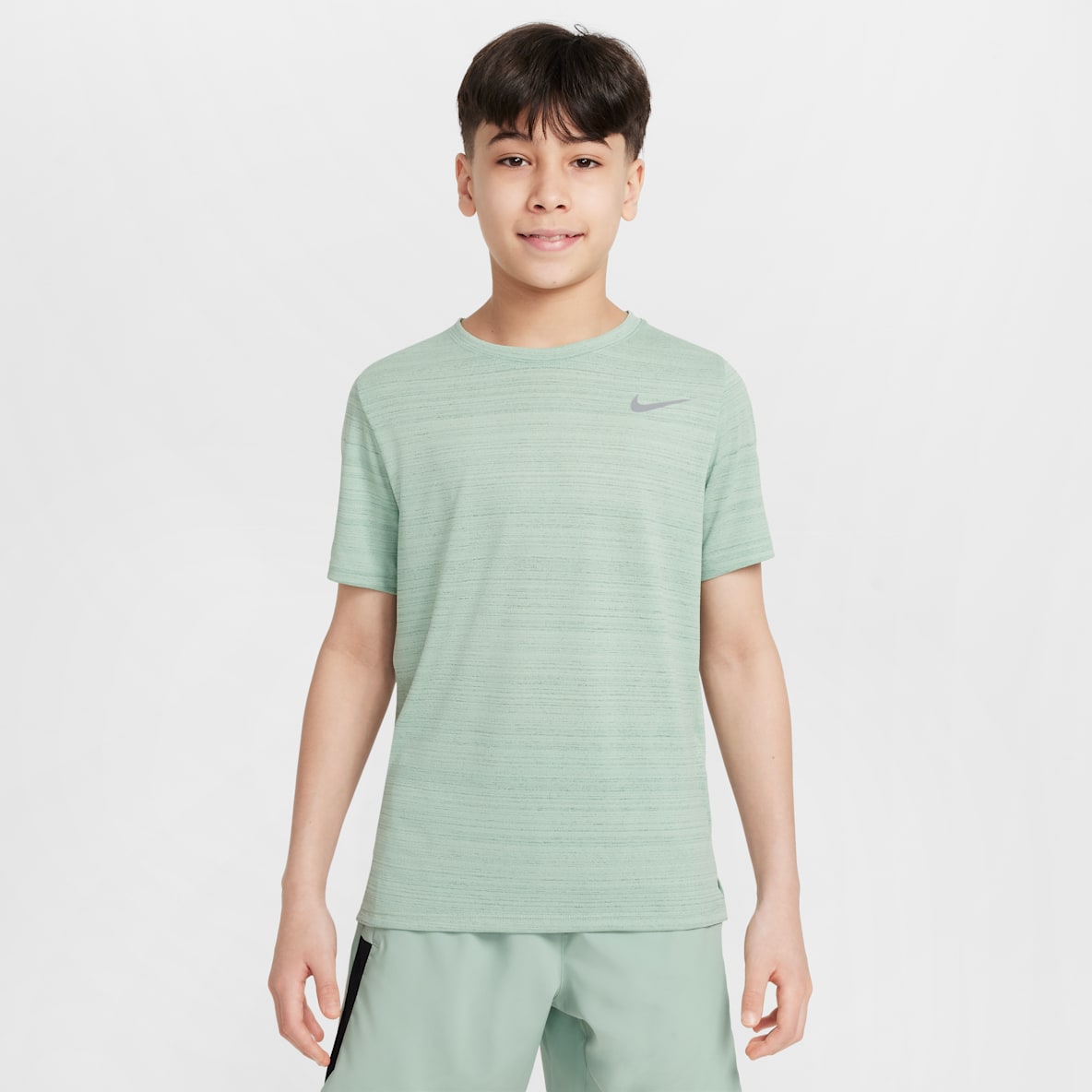 Nike Dri-FIT Miler Nike Dri-FIT Miler Playera de entrenamiento para niño talla grande