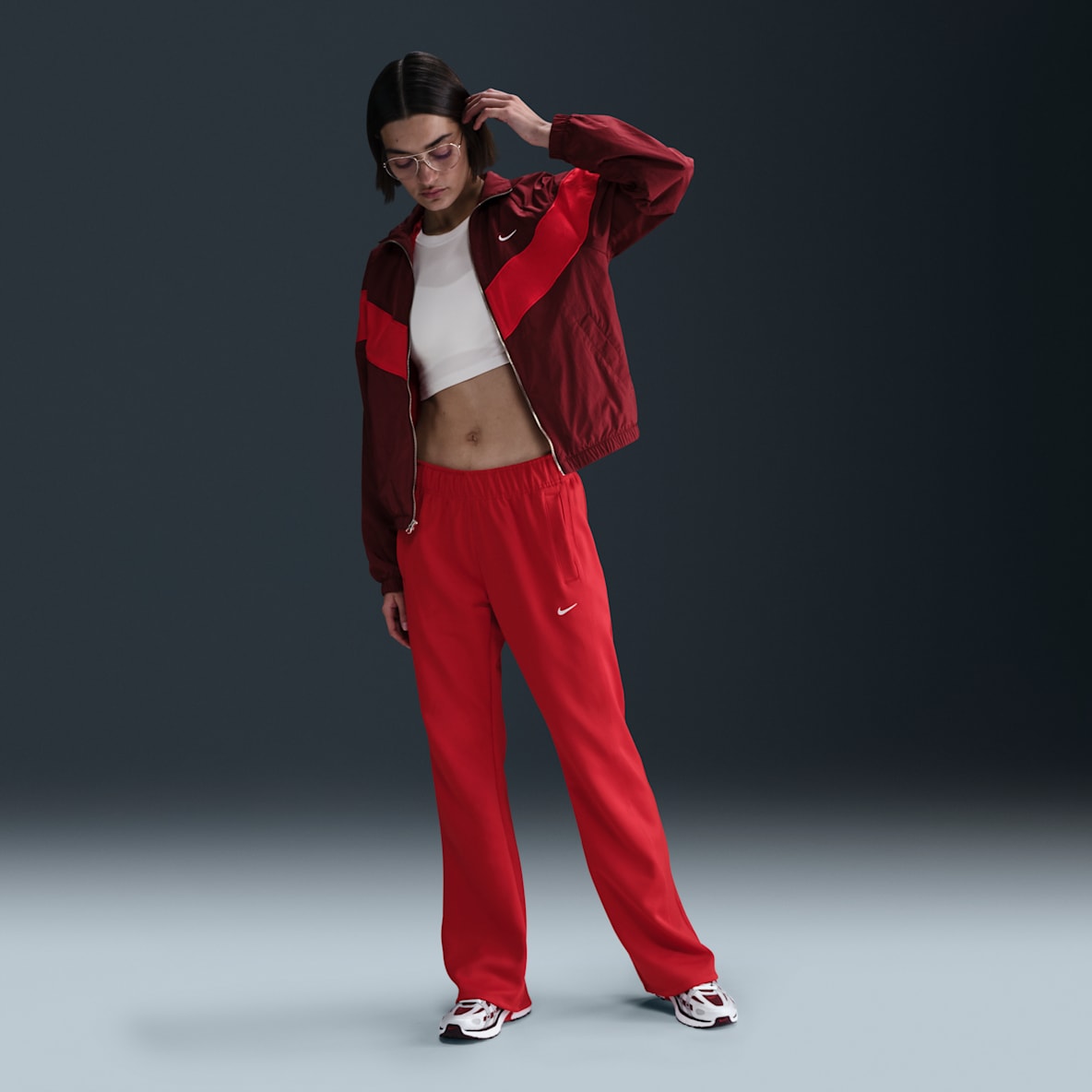 Nike Sportswear Windrunner Calças de malha de cintura normal e corte estreito para mulher