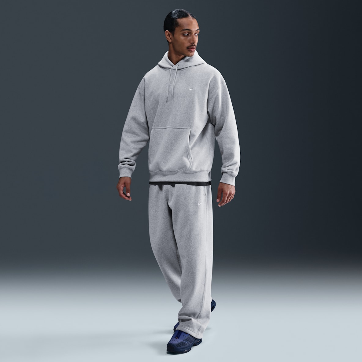 Nike Solo Swoosh Nike Solo Swoosh Pantalon en tissu Fleece à ourlet ouvert pour homme