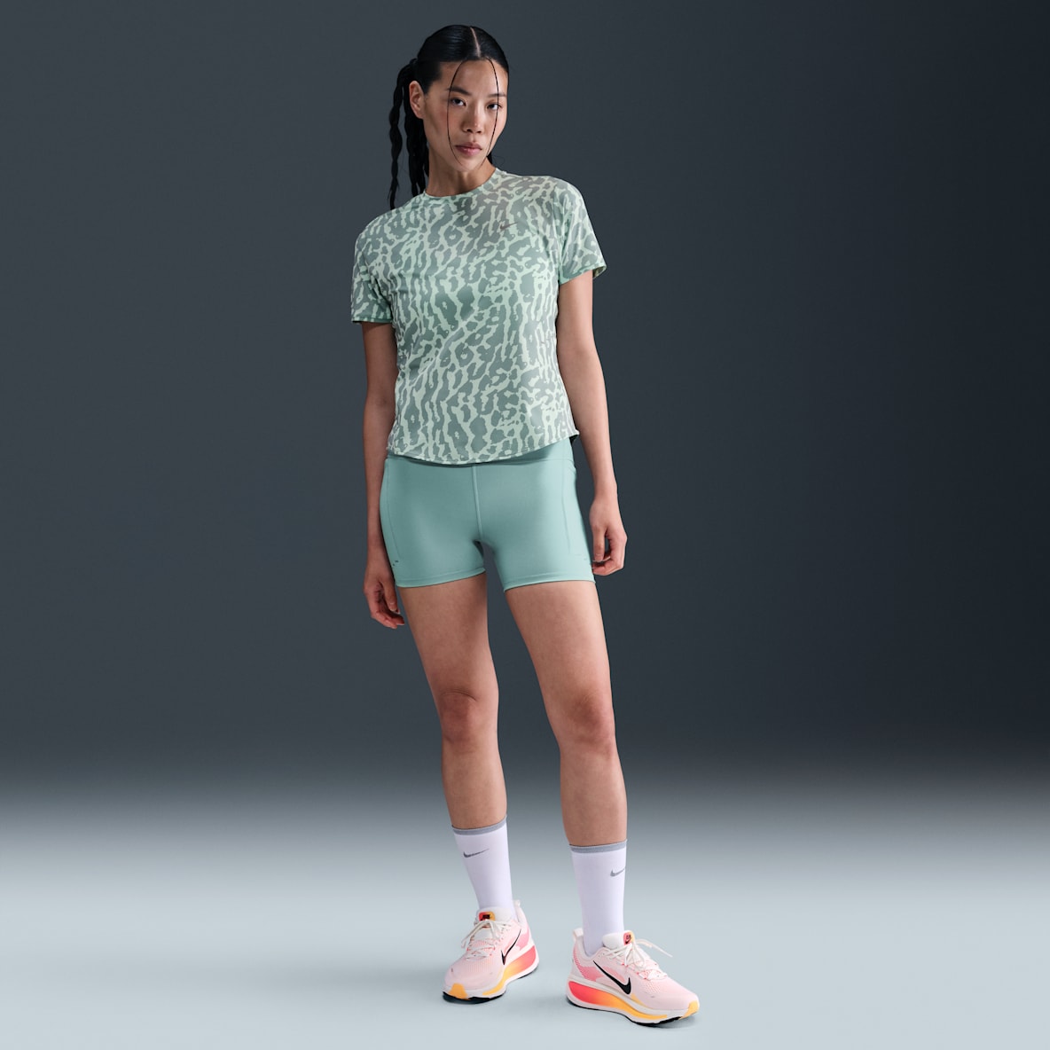 Nike Swift Women's High-Waisted 4" Tight Running Shorts with Pockets