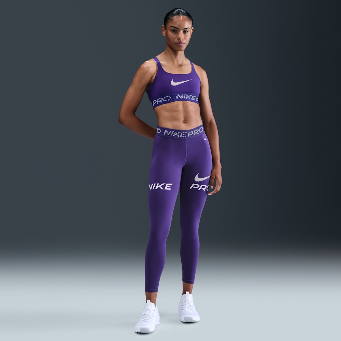 Nike Pro Nike Pro Leggings a 7/8 a vita media con grafica e inserto in mesh – Donna