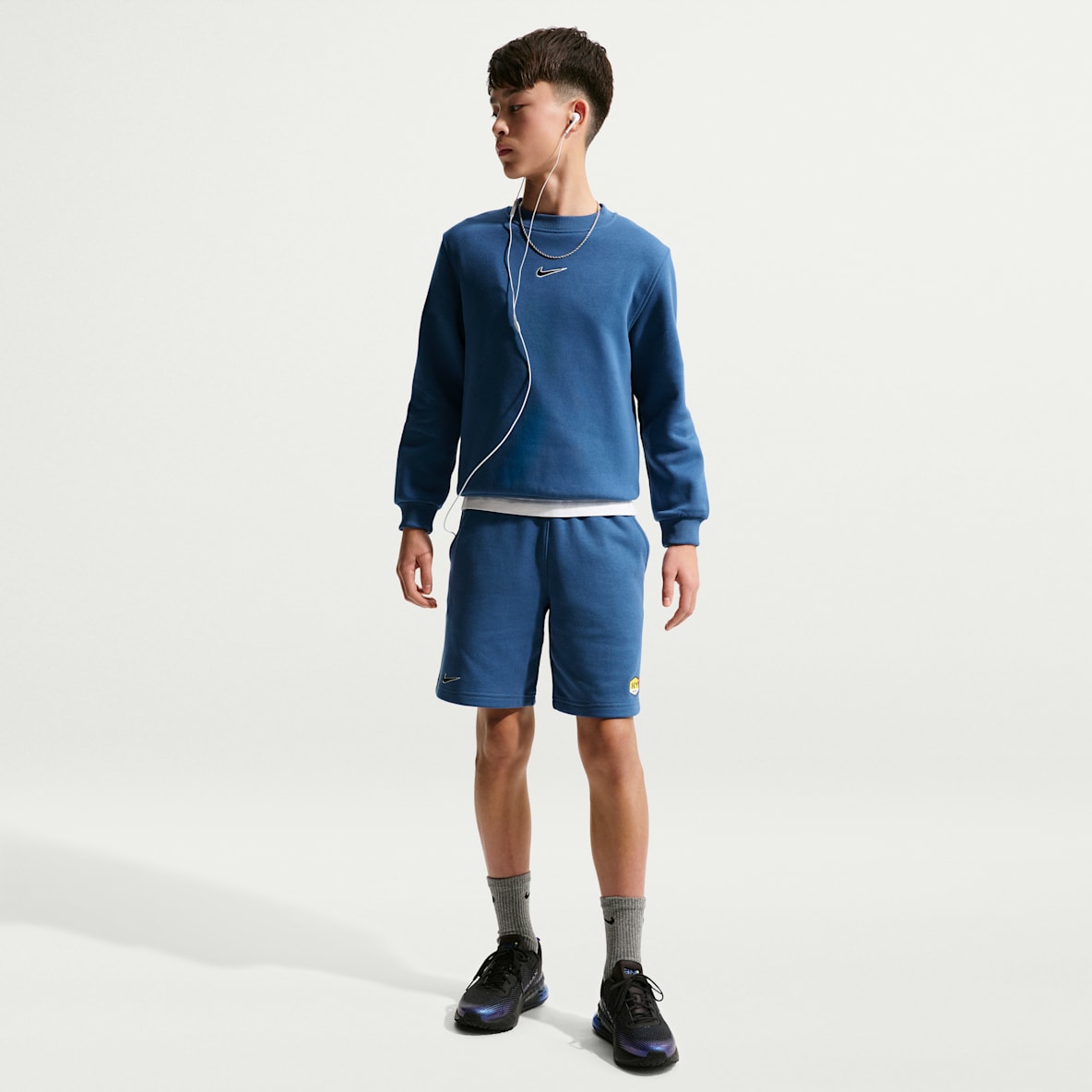 Kylian Mbappé Club Fleece Fußballshorts (ältere Kinder)