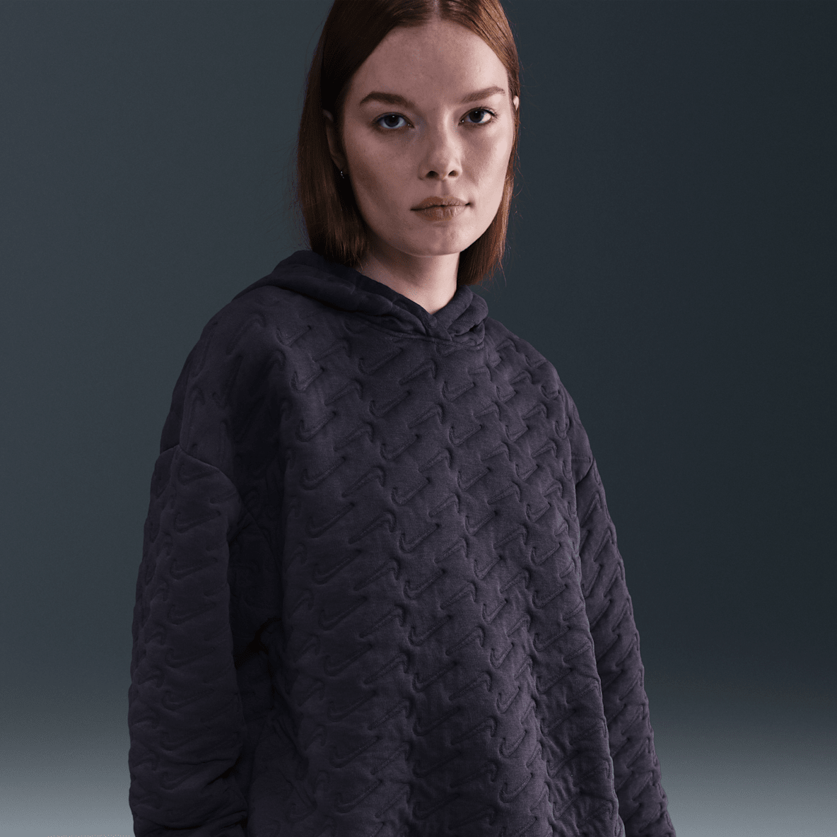 Nike Sportswear Phoenix Fleece Nike Sportswear Phoenix Fleece Jacquardhettegenser med ledig passform til dame