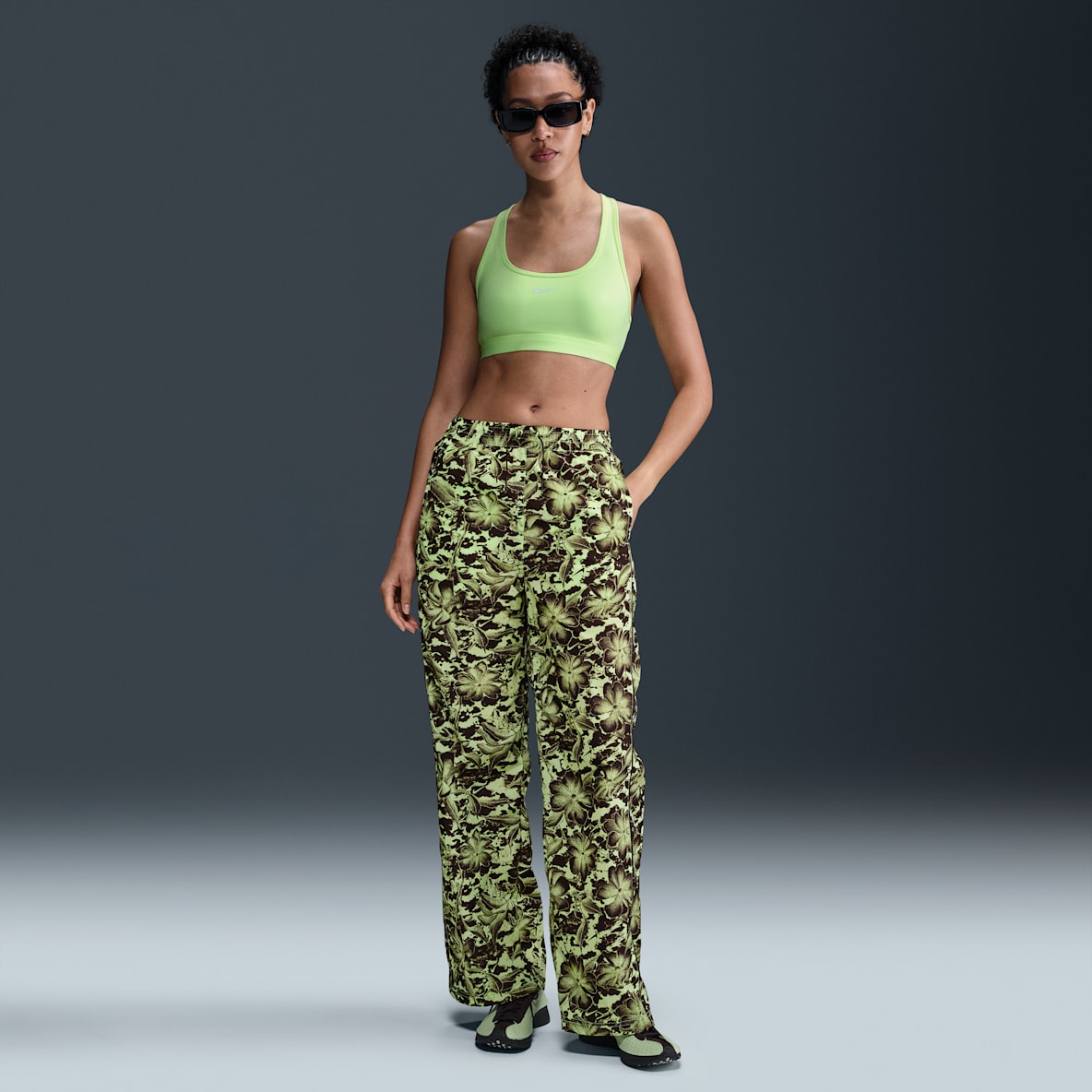 Windrunner Nike Sportswear Windrunner Nike Sportswear Pantaloni stampati a vita media in tessuto con protezione UV – Donna