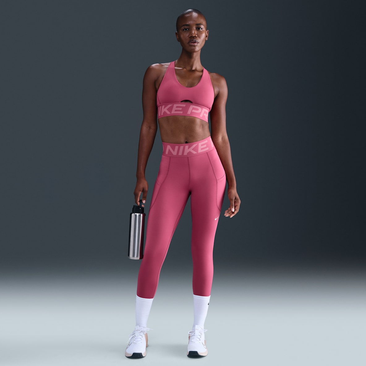 Nike Pro Sculpt Nike Pro Sculpt Leggings tiro alto de 7/8 con bolsillos para mujer