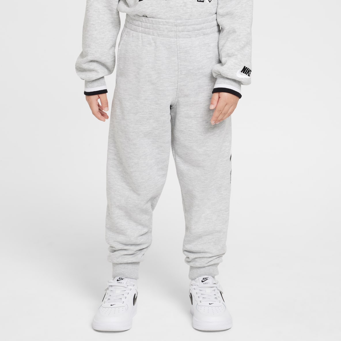 Nike Sportswear "Outside the Lines" Pants de French Terry para niños talla pequeña