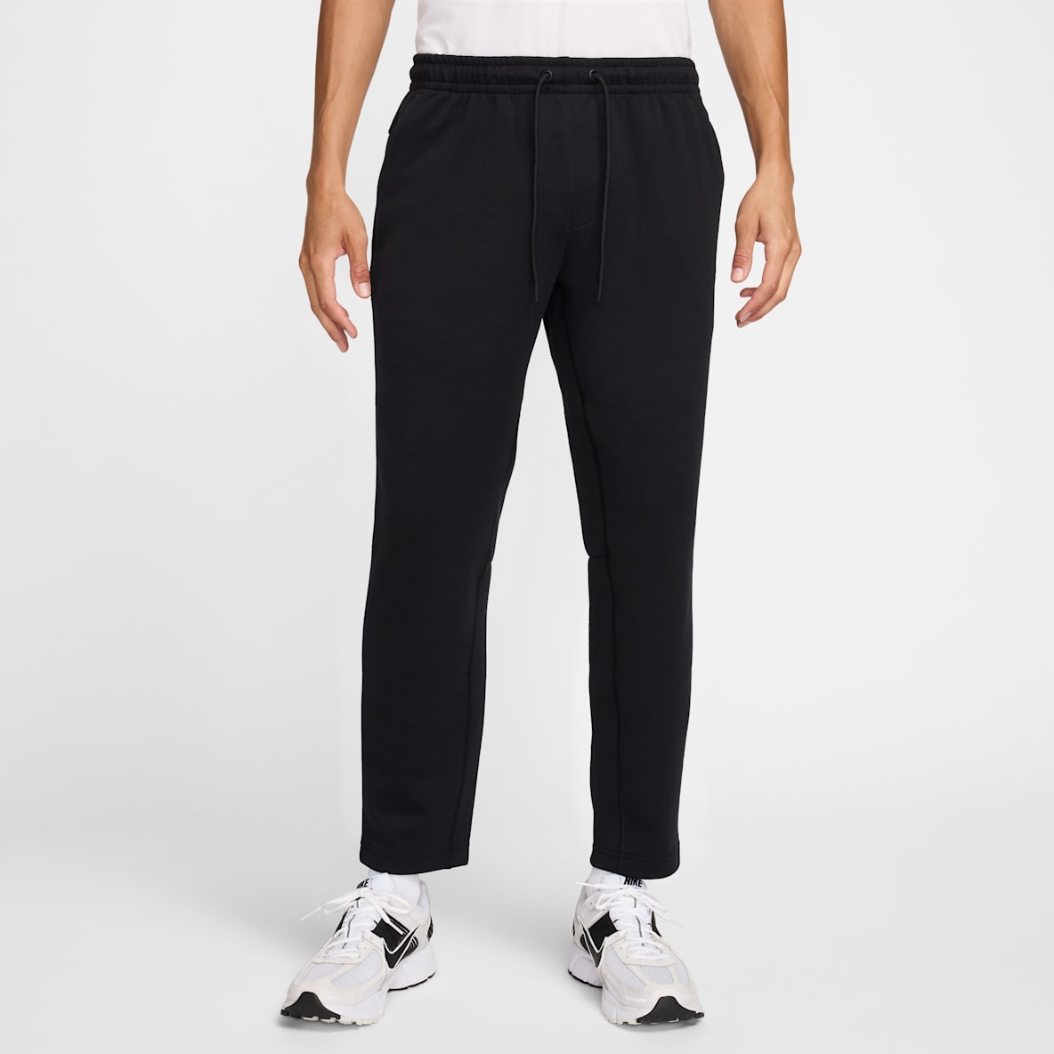 Nike Primary Fleece Nike Primary Fleece Pants de alto rendimiento Dri-FIT de pierna entallada con protección UV para hombre