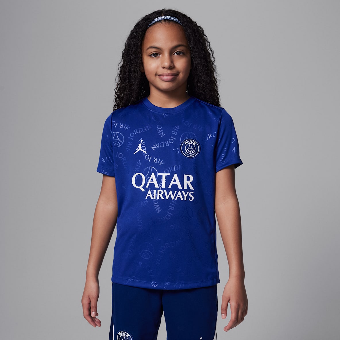 Paris Saint-Germain Academy Pro Fourth Paris Saint-Germain Academy Pro Fourth Jordan Dri-FIT kurzärmeliges Pre-Match-Fußballoberteil (ältere Kinder)