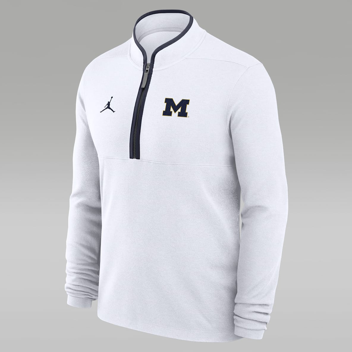 Michigan Victory Playera de manga larga universitaria marca Jordan Dri-FIT de medio cierre para hombre