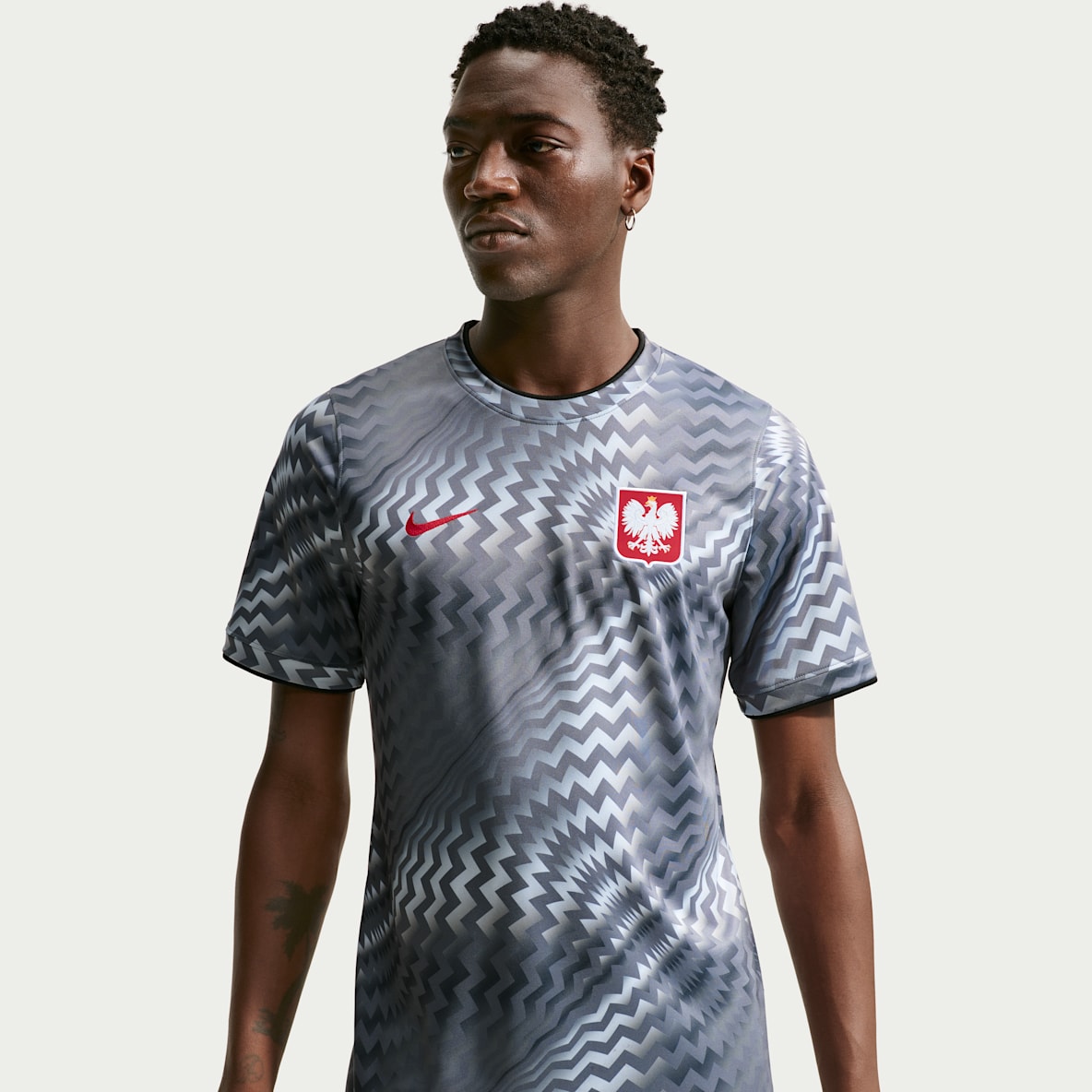 Pologne 2026 Avant-match Haut de foot à manches courtes d'avant-match Nike Dri-FIT pour homme