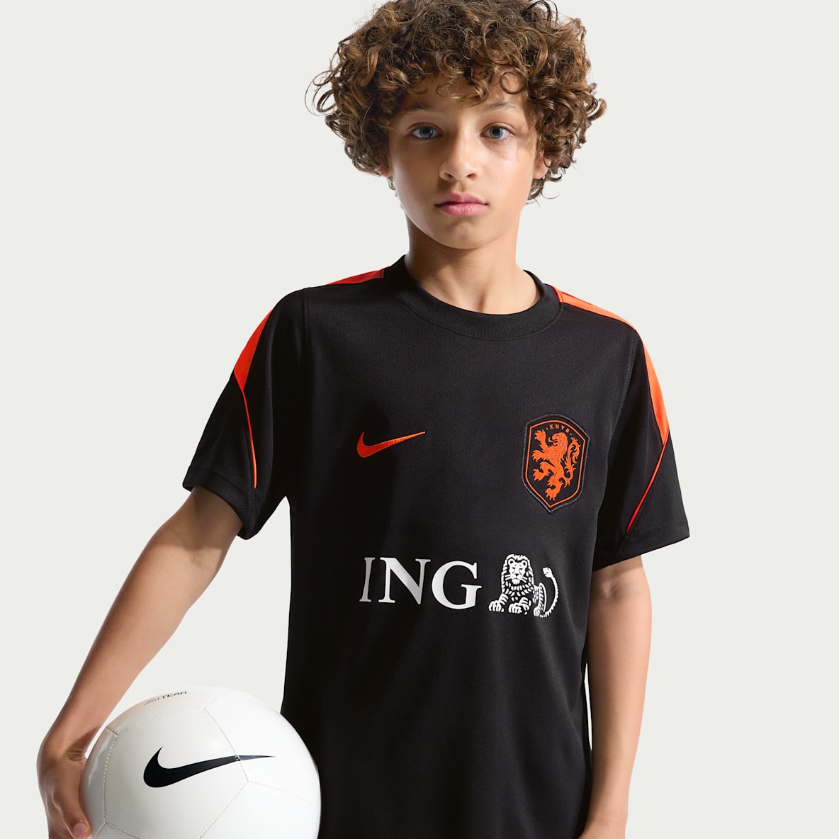 Netherlands Strike Older Kids' Nike Football Dri-FIT Short-Sleeve Top