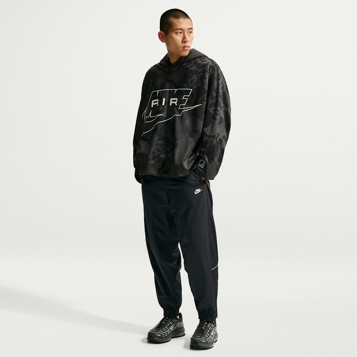 Nike Windrunner Pantalon à l'épreuve des intempéries pour homme