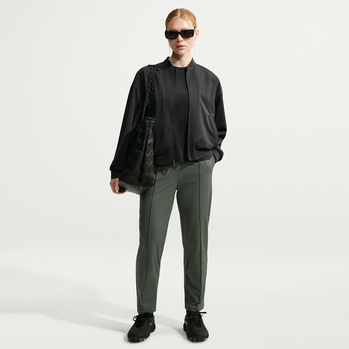 Nike 24.7 PerfectStretch Pants de pierna entallada Dri-FIT de tiro alto con protección contra los rayos UV para mujer