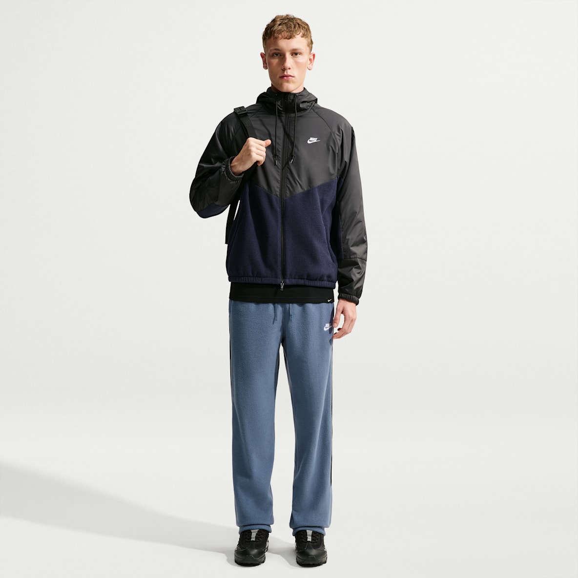 Nike Windrunner Ruimvallende Therma-FIT herenbroek
