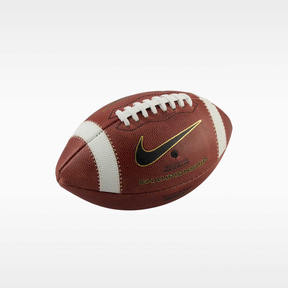 Nike Championship Futbol americano para niños grandes