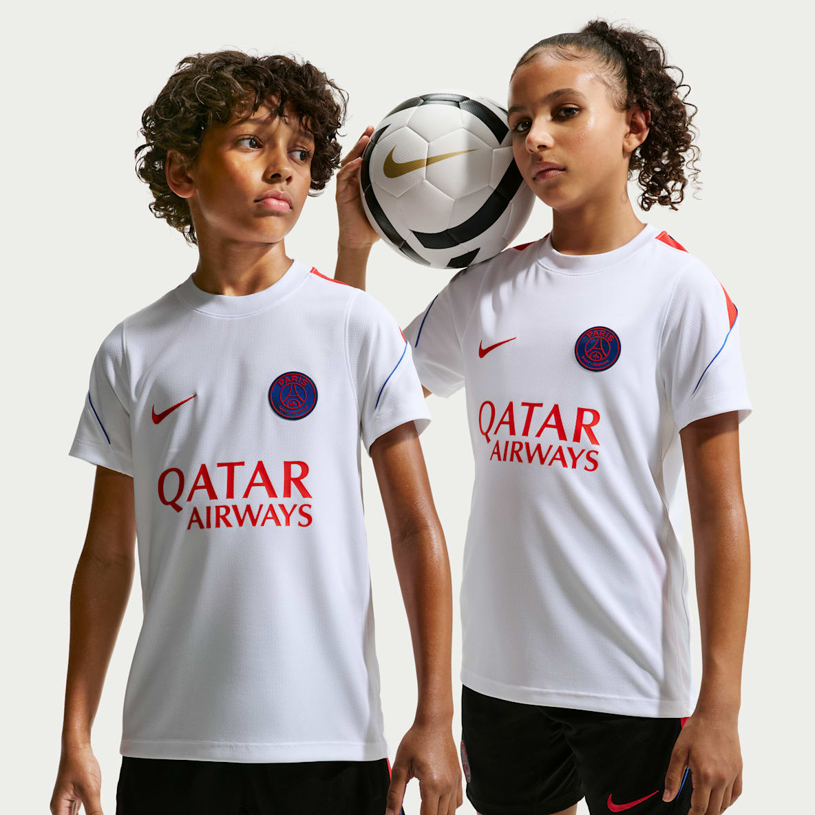 Paris Saint-Germain Strike Older Kids' Nike Football Dri-FIT Short-Sleeve Top