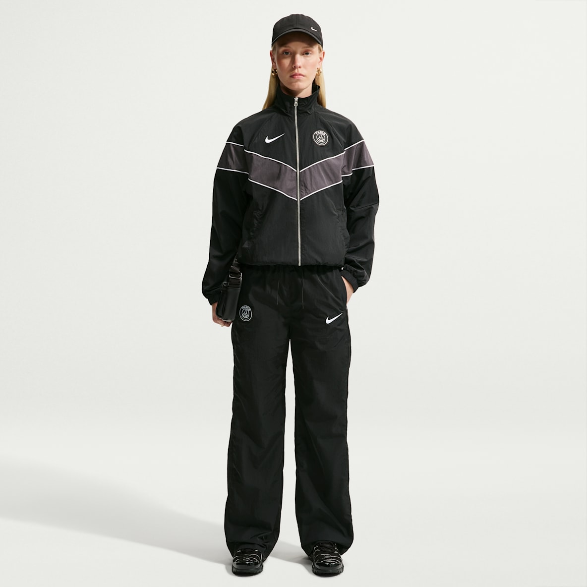 Paris Saint-Germain Windrunner Pantalon tissé taille haute Nike Football pour femme
