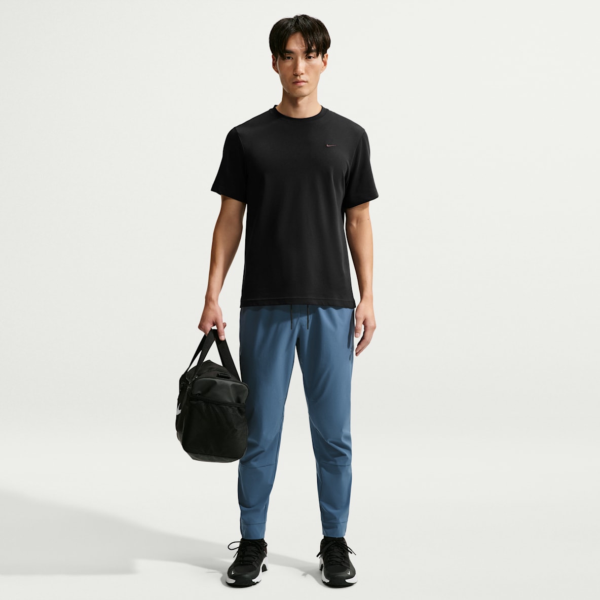 Nike Unlimited Pants versátiles Dri-FIT con puños con cierre para hombre