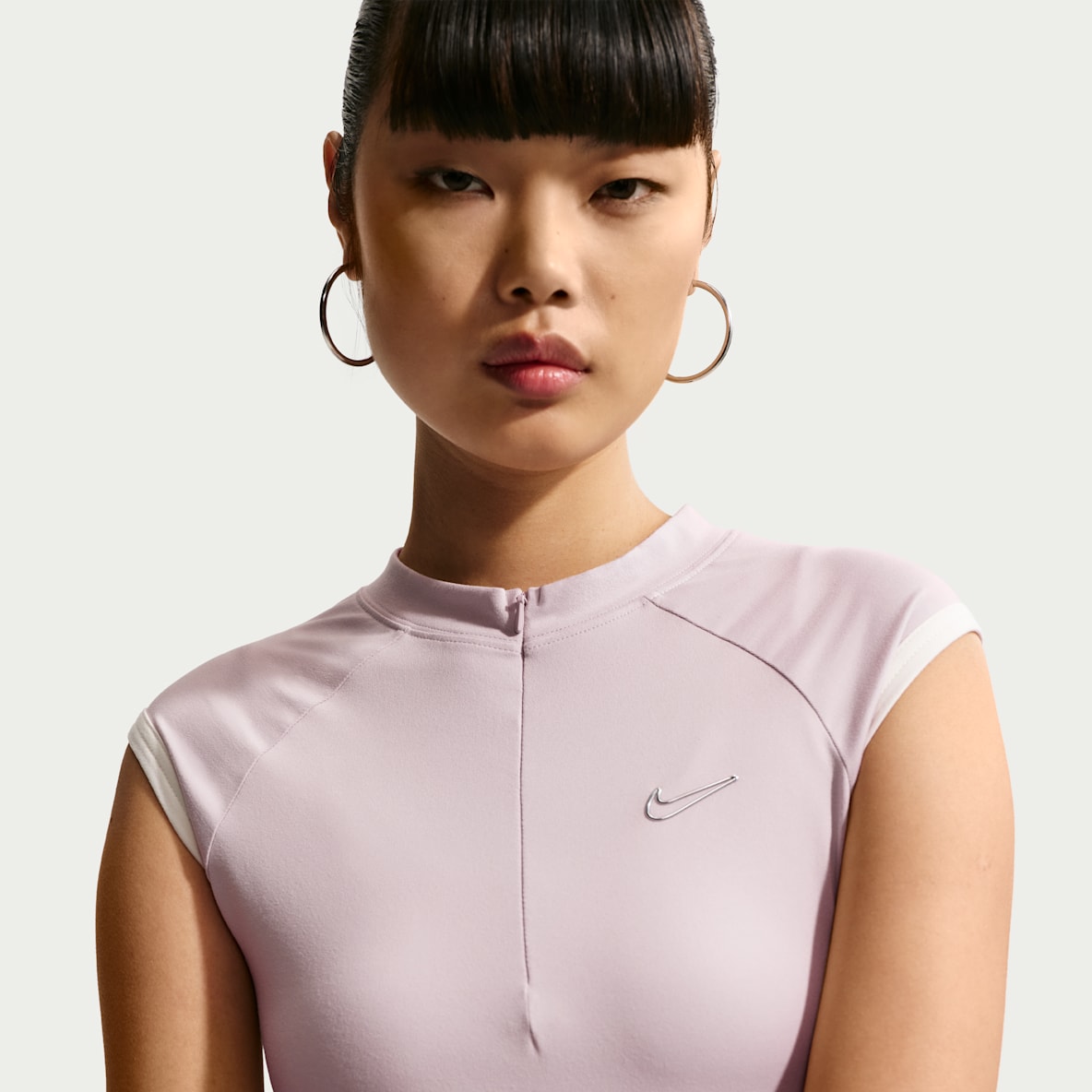 Nike Sportswear Tettsittende, ermeløs overdel med kvart glidelås til dame