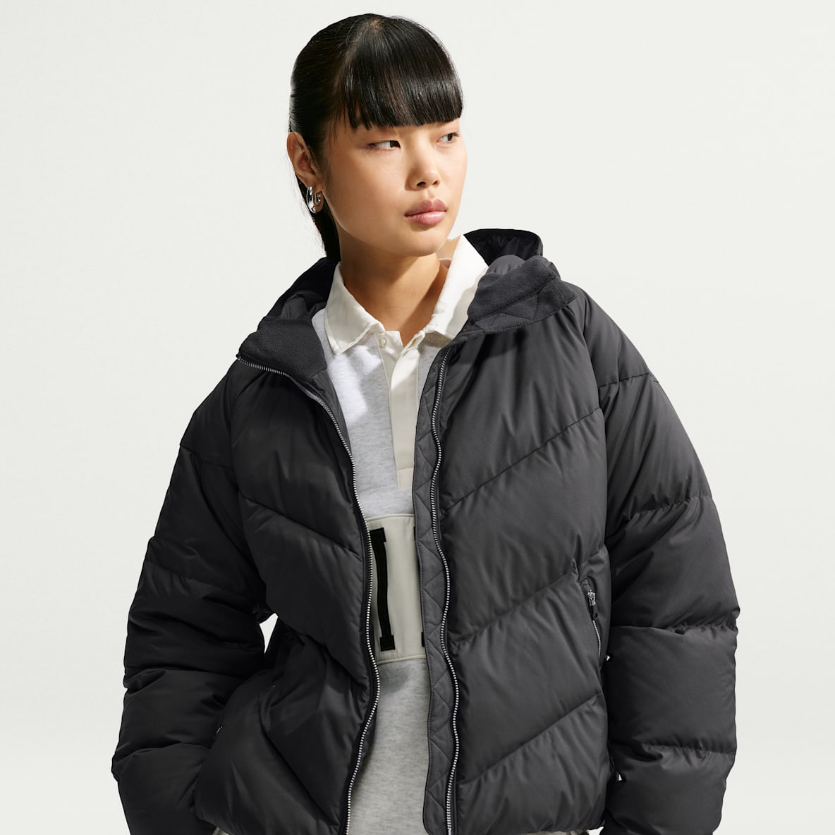 Nike Sportswear Windpuffer  Giacca in piumino dal fit ampio con cappuccio Storm-FIT – Donna