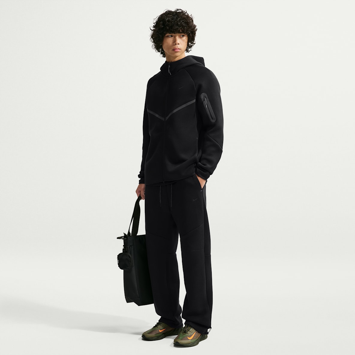 Nike Tech Pantalon à ourlet ouvert en Fleece avec motifs réfléchissants pour homme