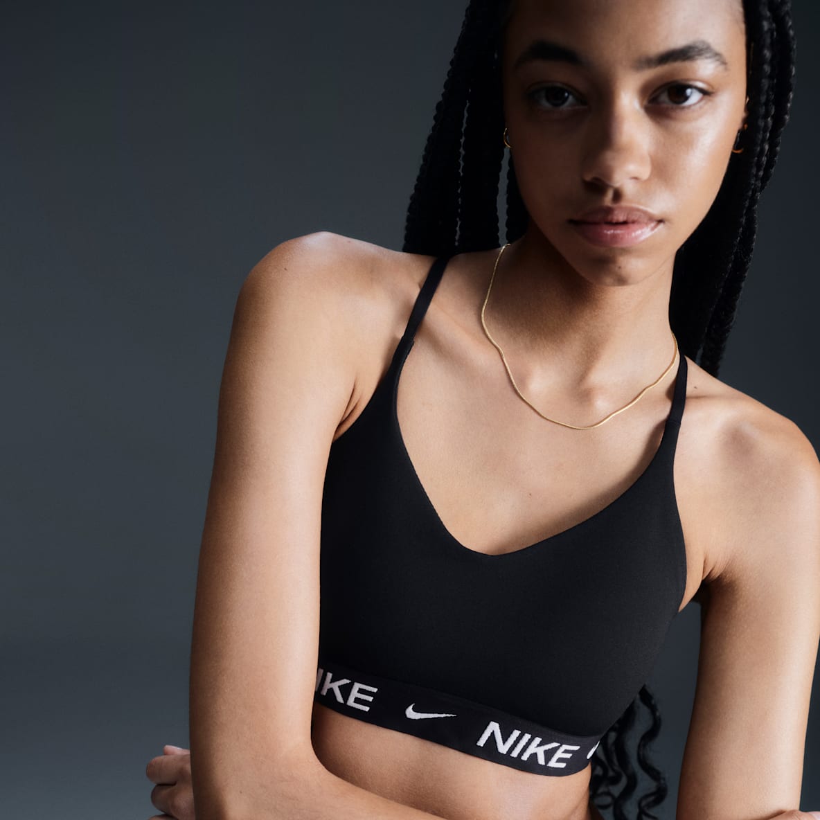 Nike Indy Light Support Justerbar sports-BH med polstring til dame