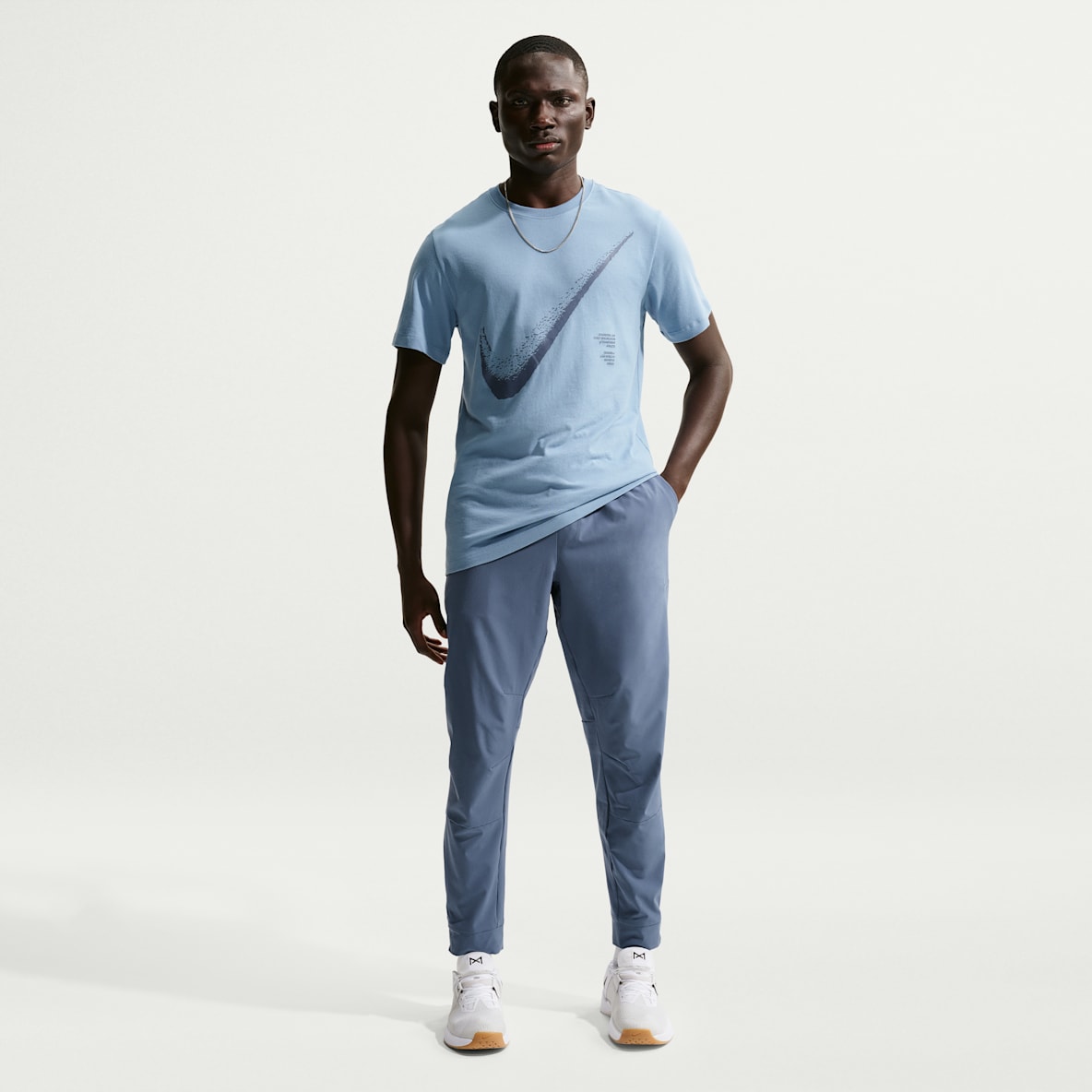 Nike Unlimited Vielseitige Dri-FIT Hose mit Reißverschluss am Bündchen für Herren