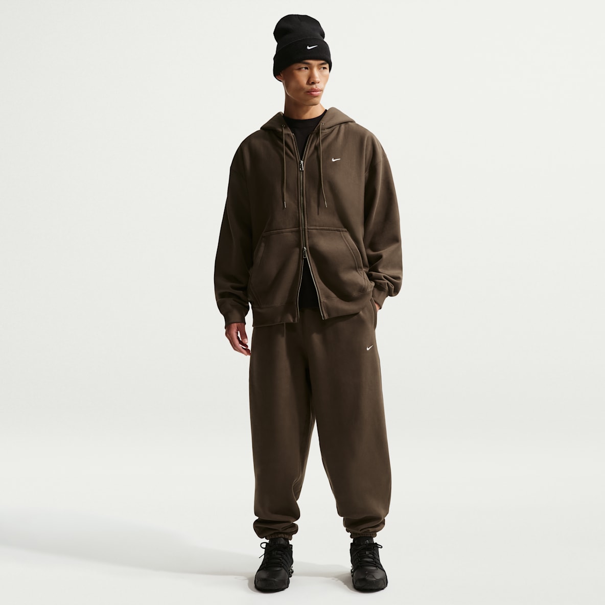 Nike Solo Swoosh Pants de tejido Fleece con puños para hombre