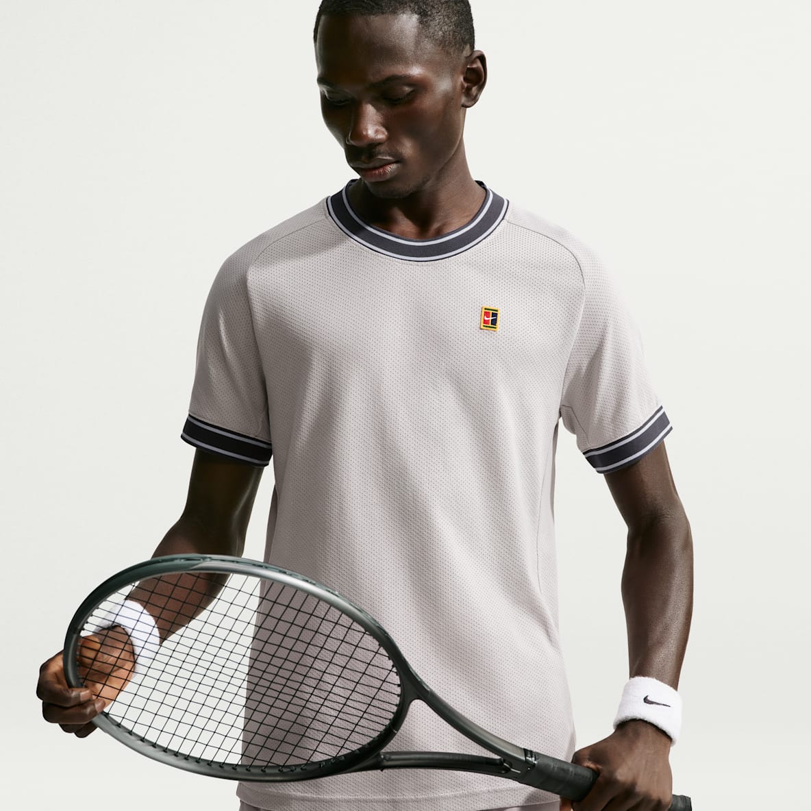 NikeCourt Heritage Prenda para la parte superior de tenis de manga corta para hombre