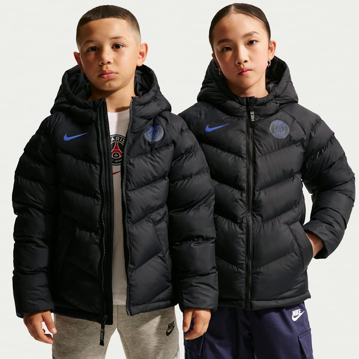 Paris Saint-Germain Nike Fußballjacke mit Synthetikfüllung und Kapuze für ältere Kinder