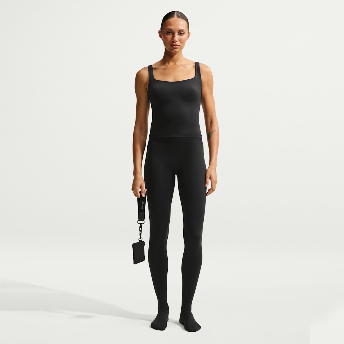 NikeSKIMS Matte Women's High-Waisted Footsie Grip Leggings