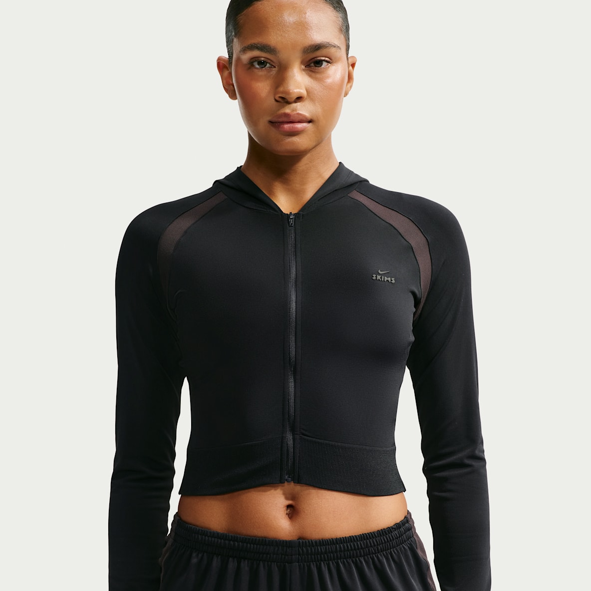 NikeSKIMS stretch strikket Babyhettejakke med glidelås til dame