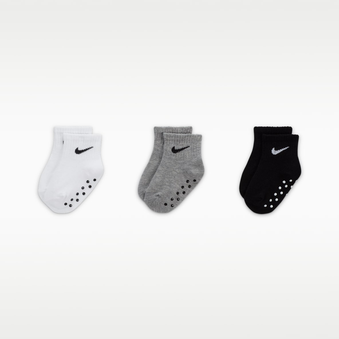 Nike Calcetines hasta el tobillo Swoosh con agarre para bebé (3 pares)