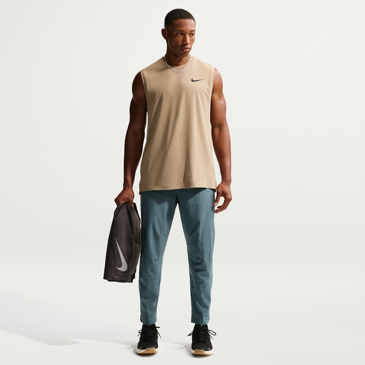 Nike Unlimited Pantalons Dri-FIT versàtils amb cremalleres a les vores - Home