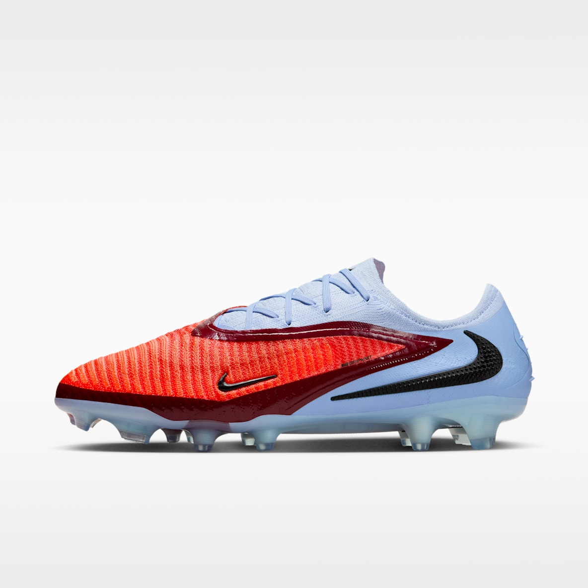 Nike Phantom 6 Low Elite Botas de fútbol para terreno firme