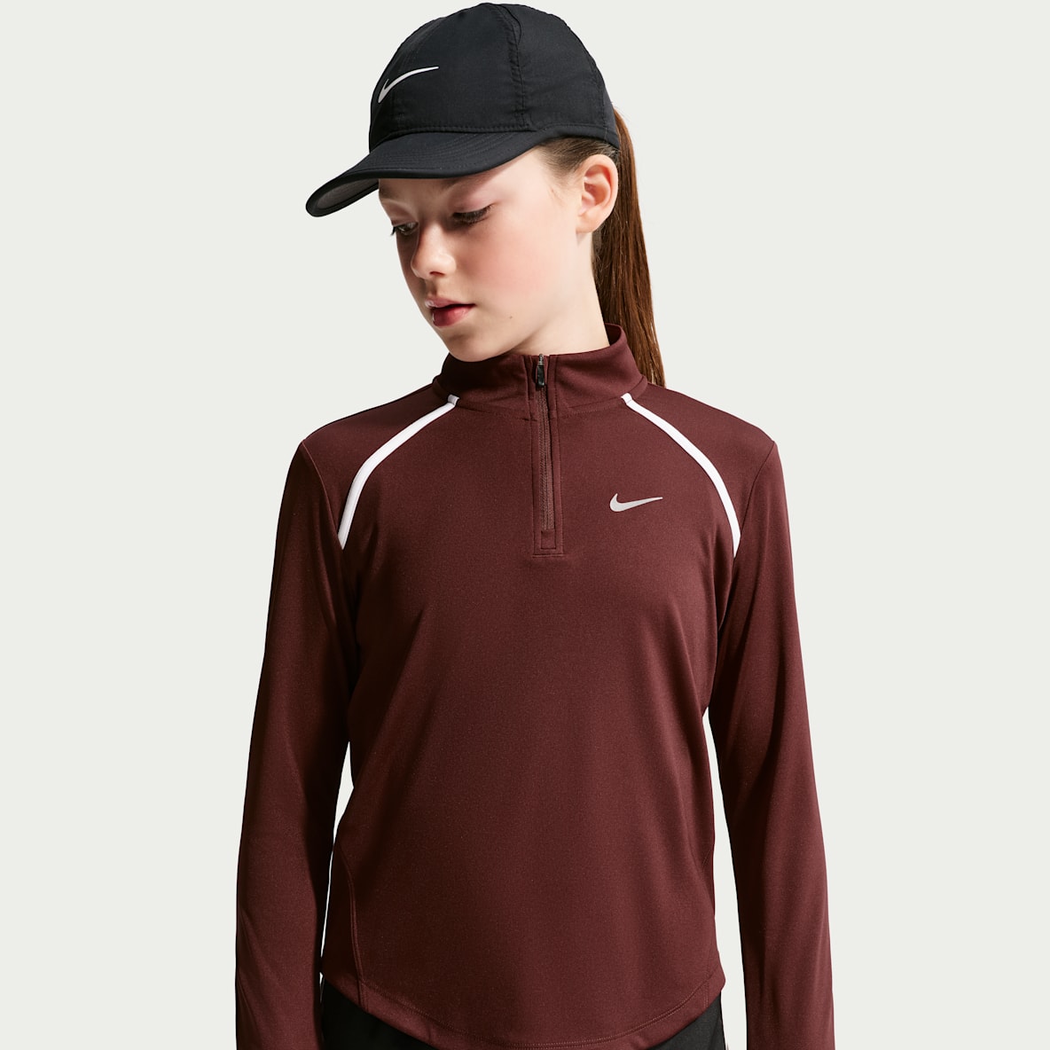Nike Tempo Långärmad tröja Dri-FIT med halv dragkedja för ungdom (tjejer)