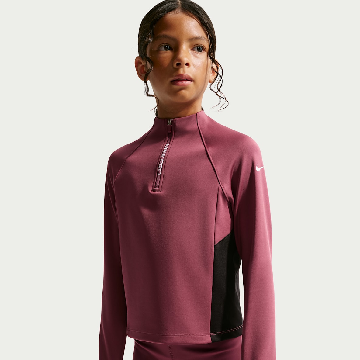 Nike Pro Camisola de manga comprida com fecho até meio Dri-FIT Júnior (Rapariga)