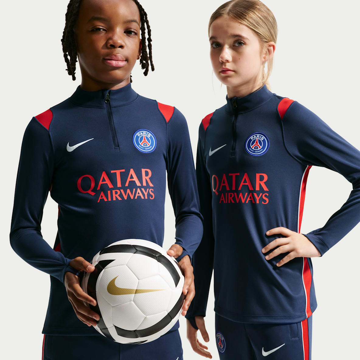 Paris Saint-Germain Academy Pro Maskinstrikket Nike Dri-FIT-fodboldtræningstrøje til større børn