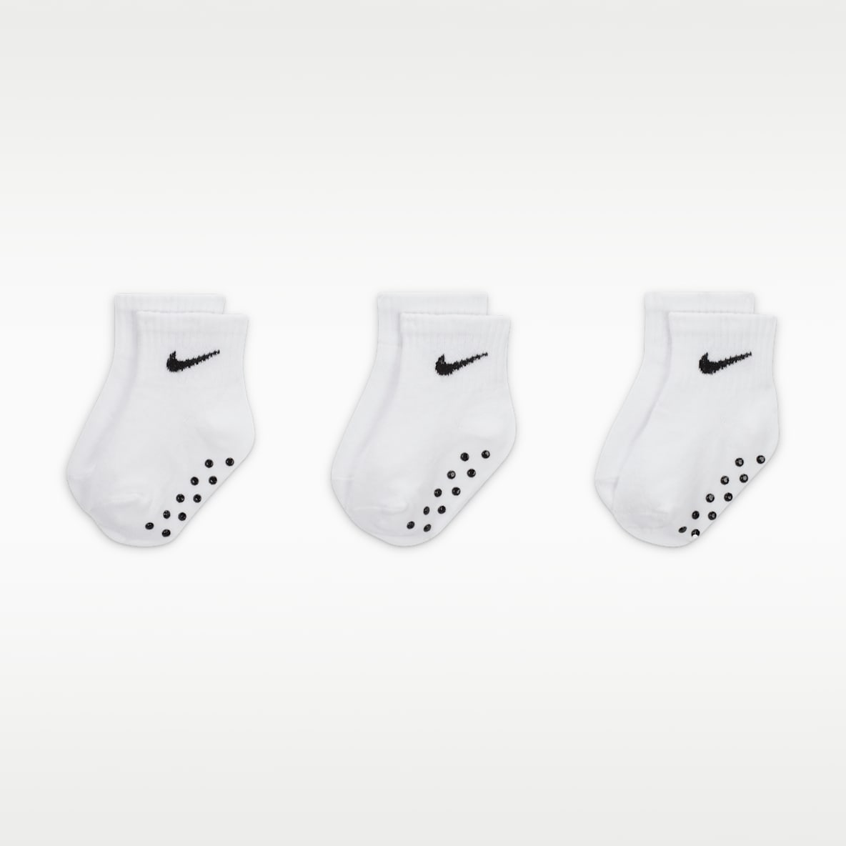 Nike Calcetines hasta el tobillo Swoosh con agarre para bebé (3 pares)